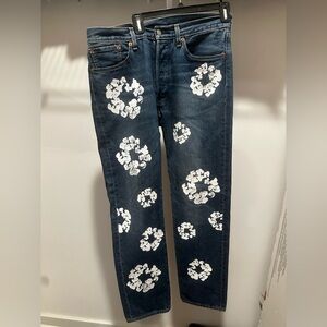 Denim tear light wash jeans